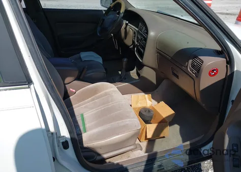 1996 Toyota Camry Dx/Le/Xle z USA, uszkodzony, nr VIN 4T1BG12K7TU753607